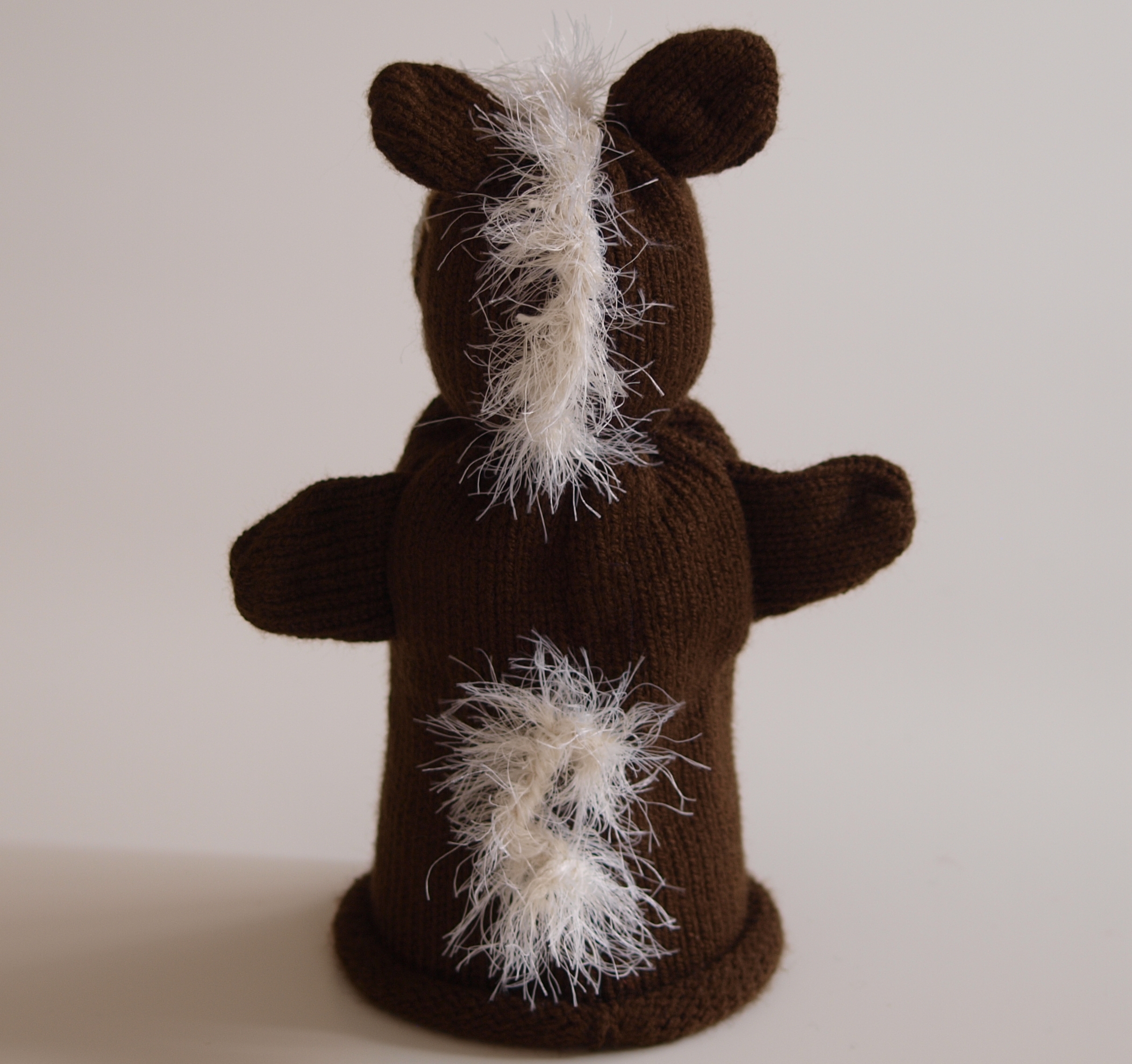 Handspielfigur Pferd von hinten