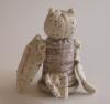 Handspielfigur Uhu von hinten